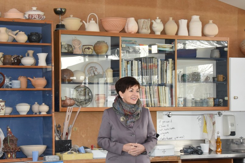 an image of Dame Patsy admiring the pottery room at the Phillipstown Community Hub
