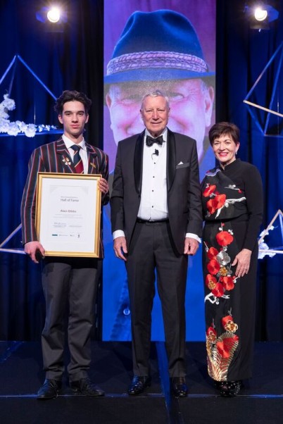 an image of Dame Patsy with Chris Baxter and inductee, Alan Gibbs