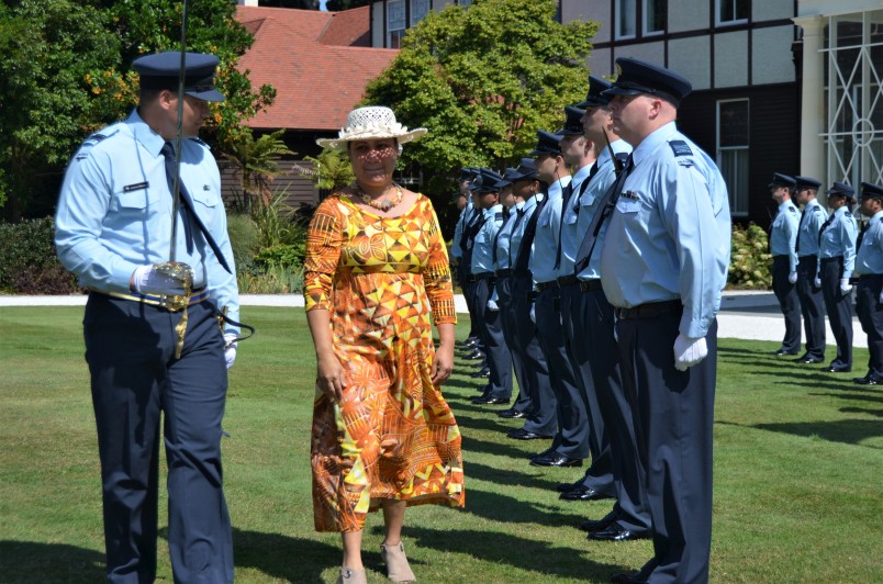 an image of HE Mrs Elizabeth Foster Wright-Koteka inspecting the guard