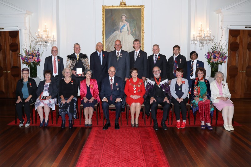 Image of Dame Patsy and Sir David with investiture recipients