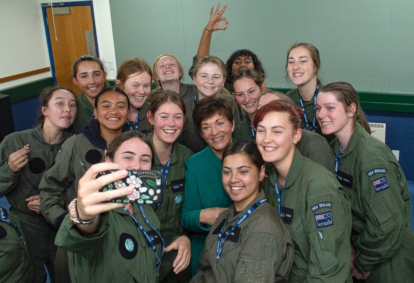 Image of Dame Patsy having a photo taken with School to Skies participants