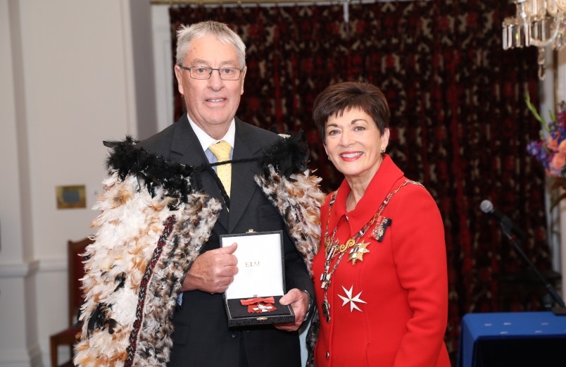 Image of David Salter collecting the insignia of a MNZM on behalf of the late Mrs Georgina Salter,of Oamaru, MNZM, for services to netball