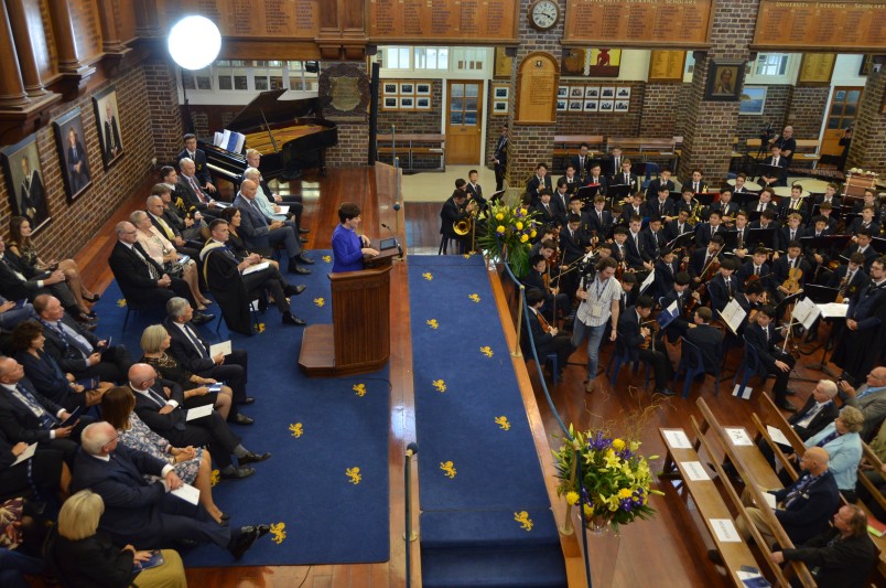 Dame Patsy addressing the commemorative Assembly at Auckland Grammar