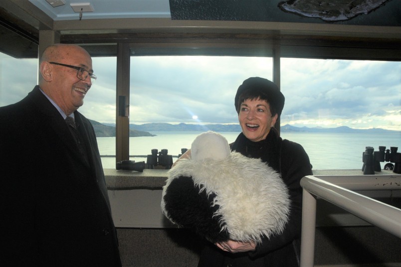 Prof Piri Sciascia and Dame Patsy, who is holding a life-size model of an albatross chick