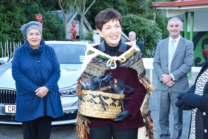 Dame Patsy with a kete woven by the custodian, Sharon Henderson