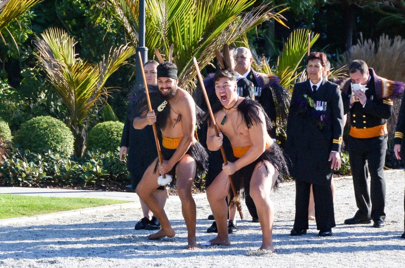 Image of a challenge from the warriors of the RNZN Maori cultural group