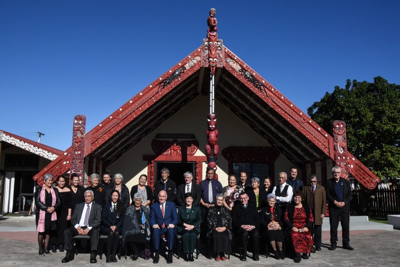 Image of Dame Patsy and Sir David with the people of Huria Marae