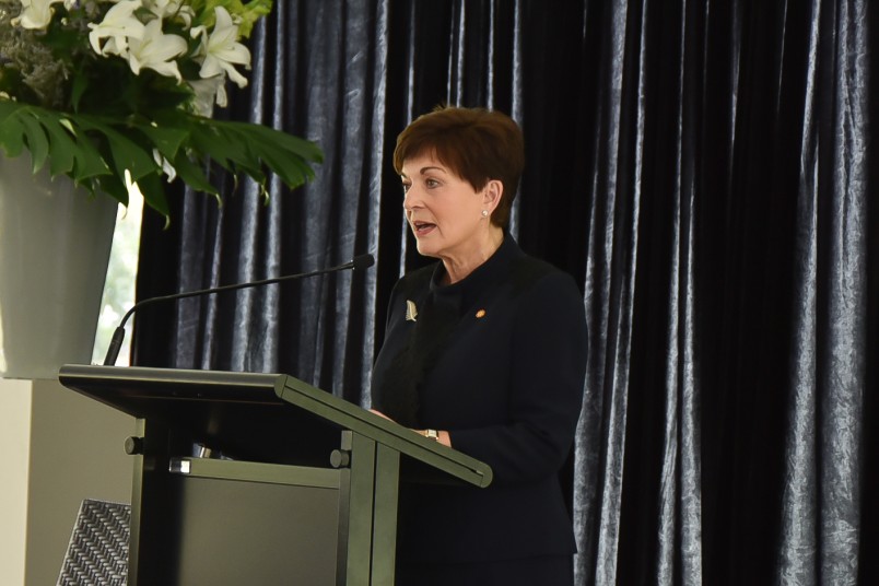 Image of Dame Patsy speaking before announcing the minute's silence