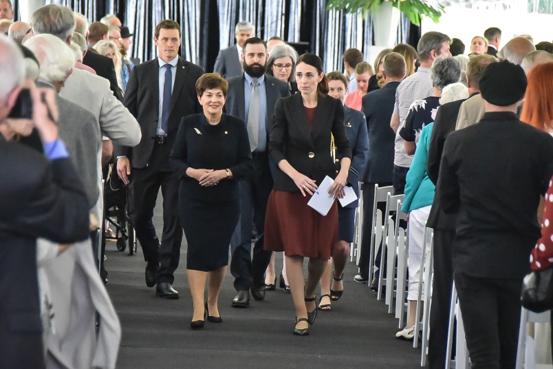 Image of Dame Patsy and the PM leaving the service