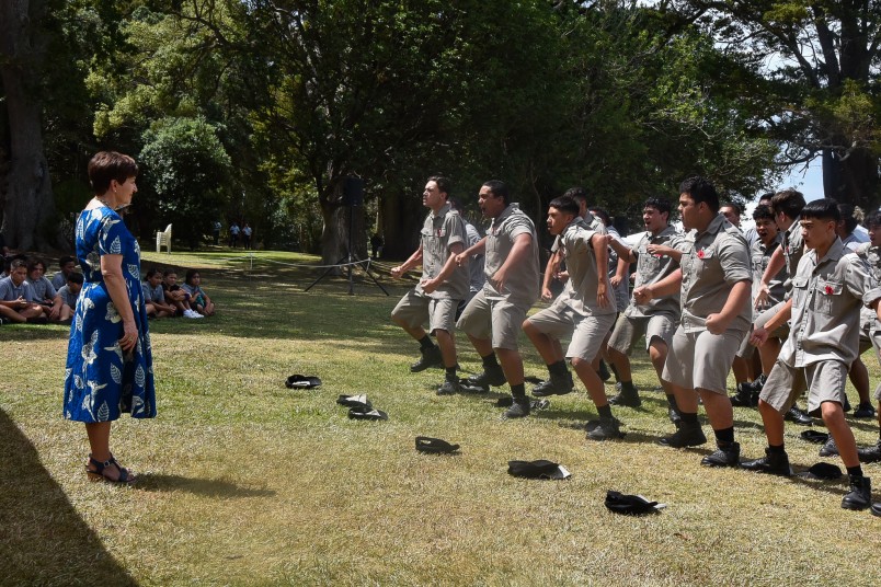 Cadets performing a haka for Dame Patsy