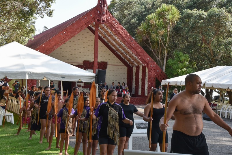 Haka powhiri about to commence in front of the whare runanga at the Waitangi Treaty Grounds