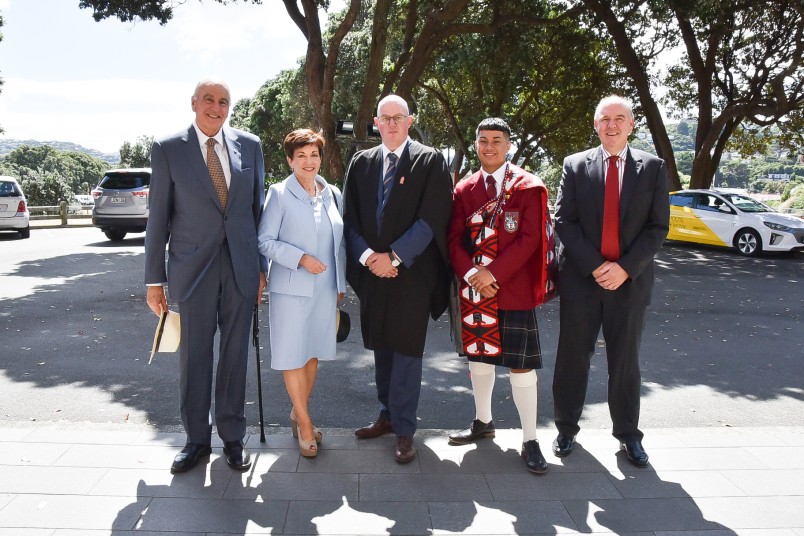 Image of Dame Patsy and Sir David being welcomed by Headmaster Graham Yule, Head Prefect Moses Moala-Mafi and Scots College Board Chair Philip Poppe