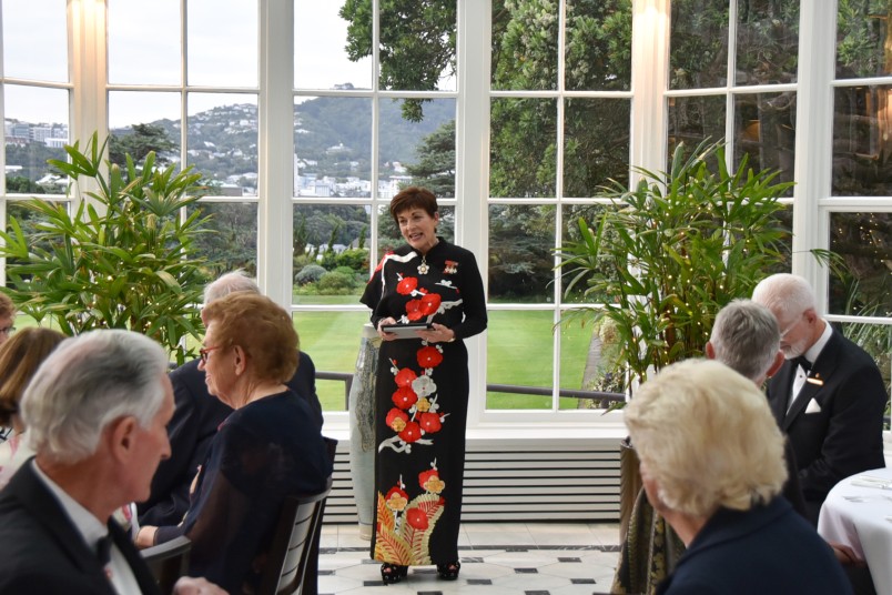 Image of Dame Patsy speaking in the conservatory