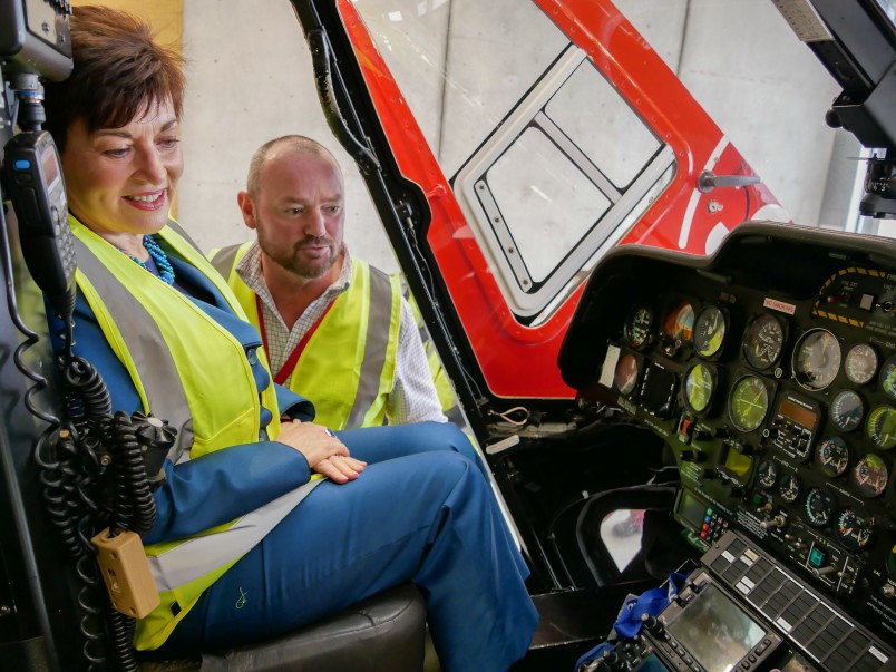 Dame Patsy Reddy in a helicopter at Life Flight 