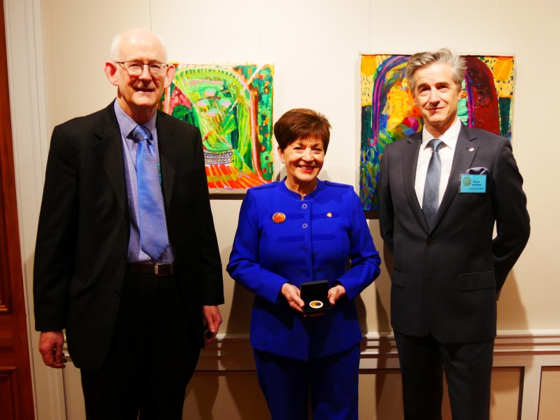 Image of Dame Patsy with Dame Patsy, Royal Numismatic Society of New Zealand President David Galt and Secretary Wayne Newman following the presentation of the conference medal to Dame Patsy