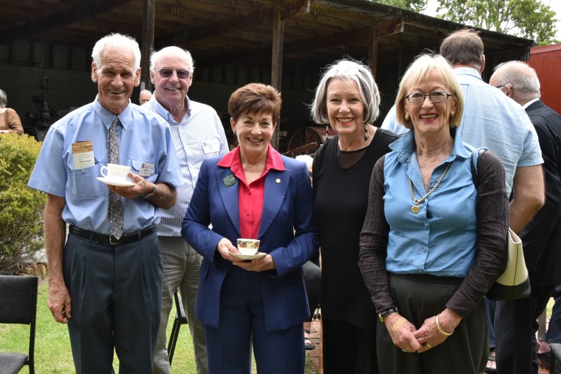 Dame Patsy Reddy with volunteers at Cobblestones Museum