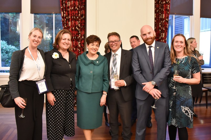 Image of Dame Patsy with guests at the reception
