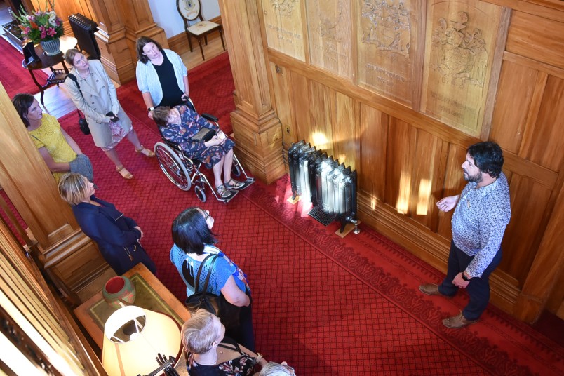 Image of Government House Visitor Centre Educator Owen Mann leading a house tour