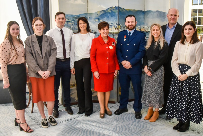 Dame Patsy Reddy with Constable Scott Higby and his family