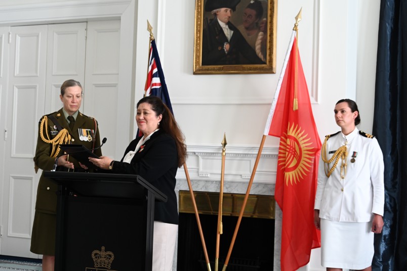 Aide de Camp handing letters of credence to Dame Cindy Kiro