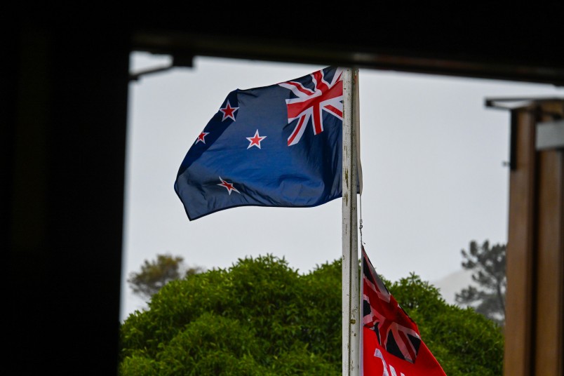 Flags blowing in Otago Peninsula's famous sea breeze