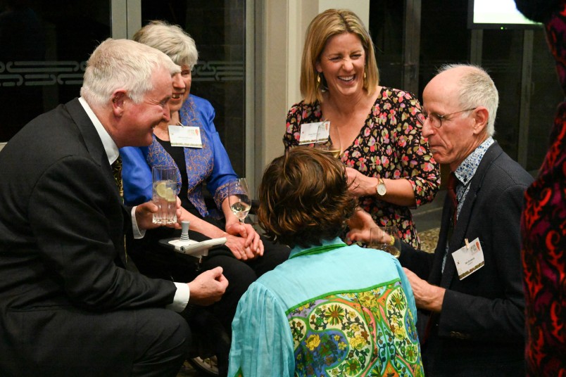 Dr Davies speaks with guests