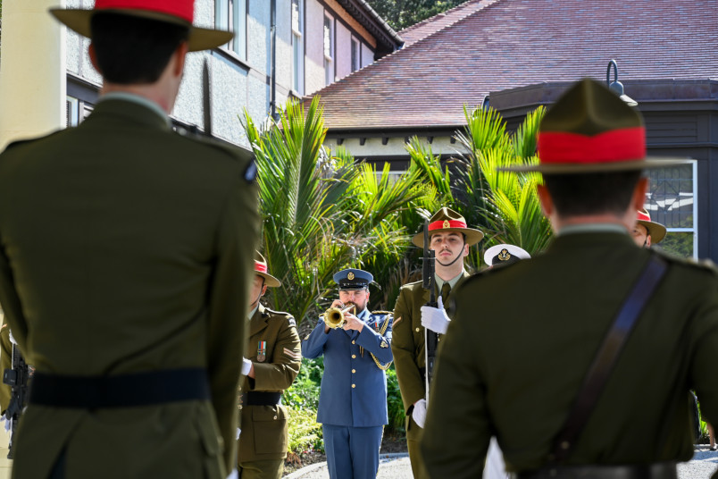 The bugler announces the arrival of a Head of Mission