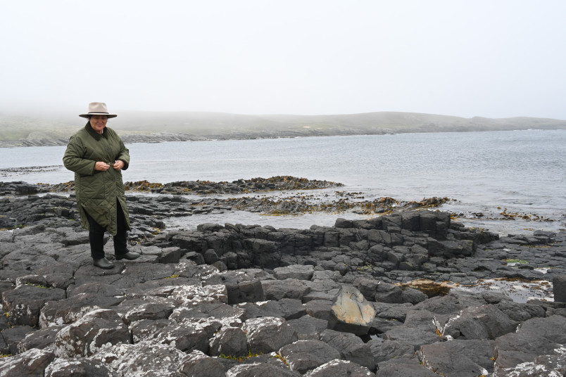 Dame Cindy on the basalt columns at Ohira Bay, Rekohu