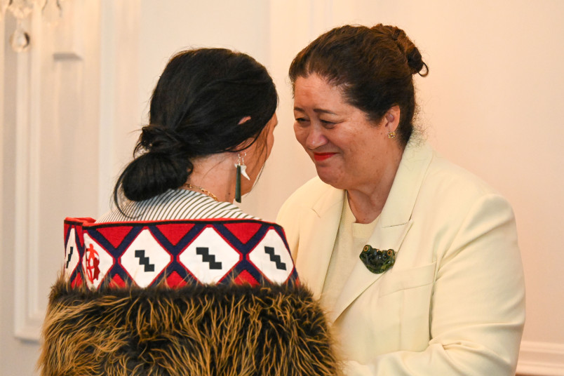 Dame Cindy congratulating recipient Rachel Puru