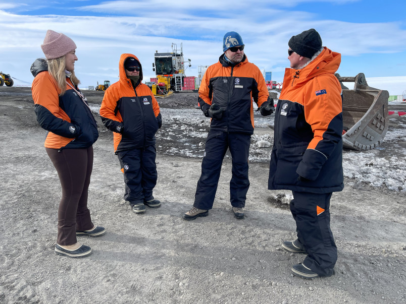 Abigail Richards, Dame Cindy, Professor Jordy Hendrikx, and Dr Davies hearing about the Scott Base redevelopment on the site.