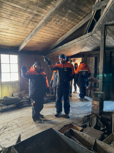 Dame Cindy with Professor Jordy Hendrikx inside Scott's Discovery Hut.