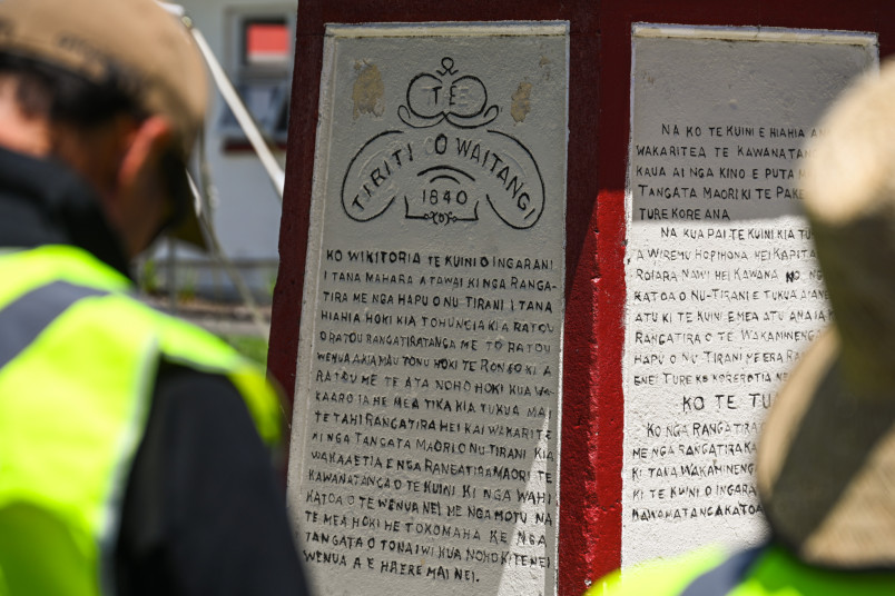 A commemorative plaque on the marae grounds