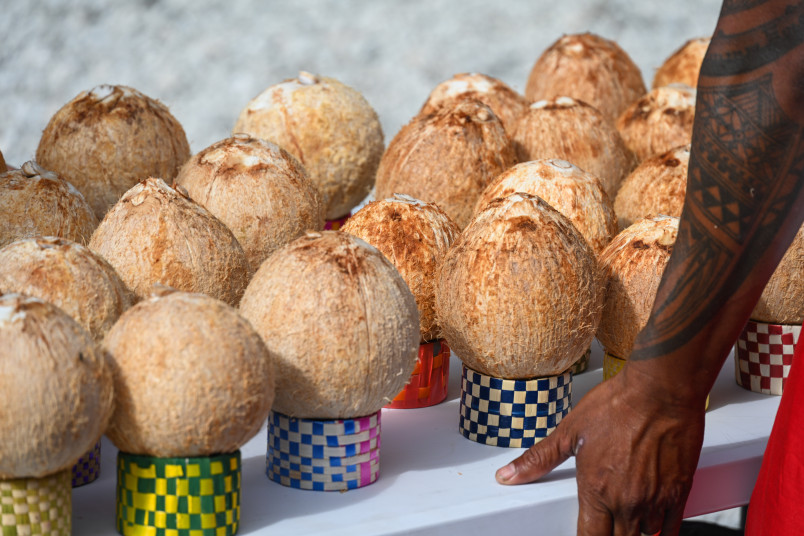 Coconuts being prepared