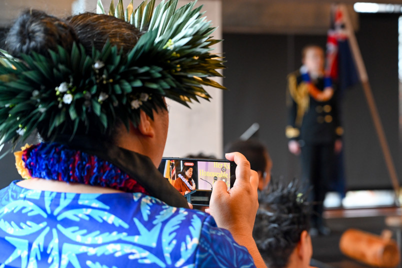 Guests watch on as Dame Cindy speaks