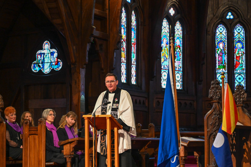The Reverend Lance Lukin leads the service