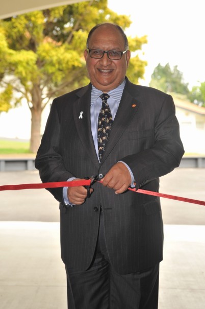 Cutting the ribbon.