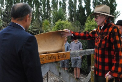 The Governor-General assist Doug Bailey in the naming of a bridge in Doug Bailey's honour.