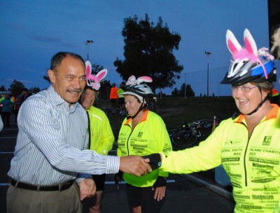The Governor-General speaks with cyclists.
