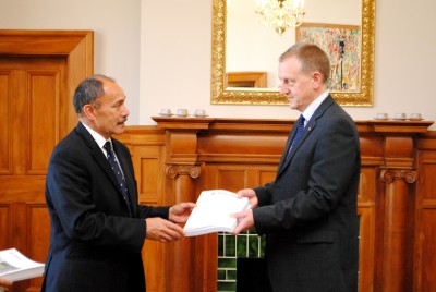 The Governor-General hands the final report of the Royal Commission to Colin McDonald.