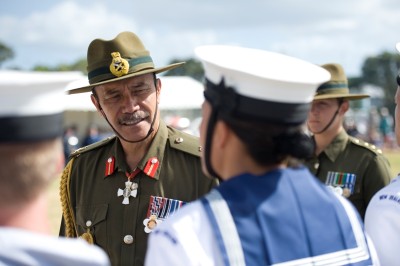 The Governor-General, Lt Gen The Rt Hon Sir Jerry Mateparae, speaks to a sailor as he inspects the Guard of Honour.