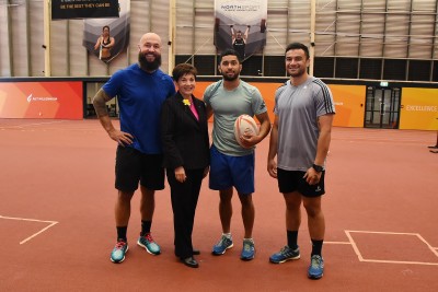 An image of Dame Patsy with NZ Sevens stars BJ Forbes, Rocky Khan and Sherwin Stower