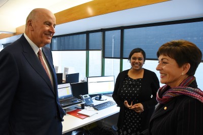 Image of Dame Patsy and Sir David meeting staff at the New Zealand AIDS Foundation