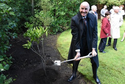 Image of Sir David Gascoigne helping out with the tree planting 
