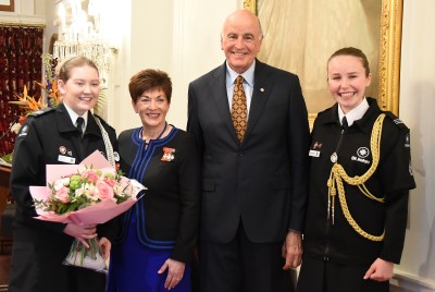 Image of Dame Patsy and Sir David with National Cadet of the Year Cascade Price and MC Ella McLure