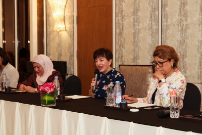 an image of Dame Patsy and Government Minister Nancy Shukri and moderator Tan Sri Datuk Dr Rebecca Fatima Santa Maria