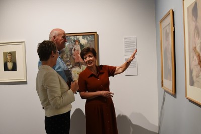 an image of Dame Patsy and Sir David at the exhibition of Frances Hodgkins' portraits