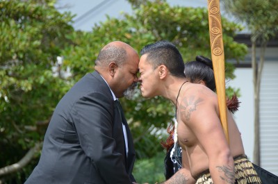 an image of HE Mr Johnson Naviti greeting a member of the cultural party