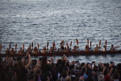 an image of the waka crew and some of the thousands of spectators