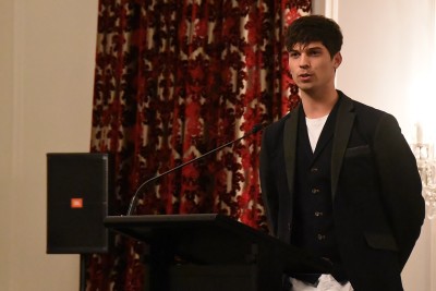 Image of choreographer Corey Baker speaking about his career