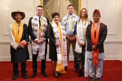 Image of Dame Patsy with recipients and guests after the presentation of Nepalese scarves